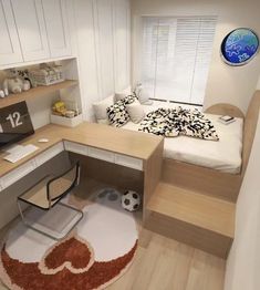 a room with a bed, desk and shelves