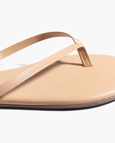 Our iconic style, reimagined in vegan leather. Handcrafted from soft leather-like, 100% PU in a classic flip flop silhouette. A true wardrobe staple, with a cushioned insole for comfort and a rubber outsole for grip. Put these on repeat all summer long. SIZING TKEES footwear is listed in US whole sizes If you are a half size, please size up DETAILS Vegan Leather Upper Vegan Leather Insole Rubber Outsole Made in Brazil Leather Flip Flops Womens, Free People Swim, Nude Sandals, Long Linen Dress, Body Milk, Leather Flip Flops, Iconic Style, One Piece Swim, On Repeat