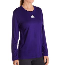 Long performance t-shirt gives you more wicking coverage with light stretch and a more cottony texture. Made of polyester. Crewneck with a smooth band. Long sleeves with smooth knit cuffs. Adidas logo at center of chest. Climalite wicking tech helps fabric breathe, shuttles moisture away and therefore dries out more quickly. Reflective detail at back right, above hem. Tag attached to inner neck. Regular fit. Adidas Women's Creator Climalite Long Sleeve Crew Neck Tee in Collegiate Purple (12H6) | Striped Leggings, Wide Cuff, 1/4 Zip, Adidas Logo, Knit Cuff, Crew Neck Tee, Adidas Women, Cotton Shorts, Long Sleeve Tshirt Men