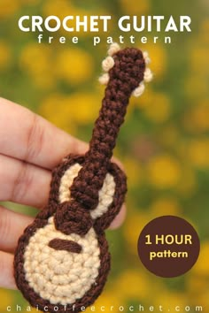 a crocheted monkey keychain is being held by someone's hand