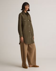 Our 100% Merino Wool Long Shirt Jacket is your perfect go-to style as the temperature starts to drop. Expertly tailored with boiled merino wool, this shirt jacket - shacket - has the relaxed silhouette of a shirt, but provides the warmth of a jacket. With an intentionally oversized look, it's perfect for layering and made to throw on over any outfit with ease.  | Quince | Women's 100% Merino Wool Long Shirt Jacket in Olive Grove, Size XS Wool Button-up Top For Winter, Casual Wool Coat With Buttons And Long Sleeves, Casual Wool Collared Outerwear, Winter Utility Jacket With Lapel Collar, Winter Workwear Utility Jacket With Relaxed Fit, Everyday Winter Shacket With Flap Pockets, Casual Wool Coat With Lapel Collar And Buttons, Winter Utility Jacket With Buttons And Relaxed Fit, Casual Collared Wool Coat With Pockets