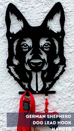 german shepherd dog head hook hanger on the side of a building with text overlay that reads, german shepherd dog lead hook hanger