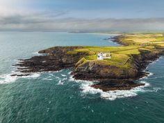 an aerial view of the coast and lighthouses