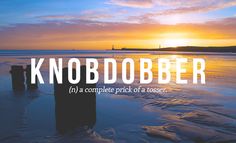 an image of a sunset with the words knob dober in front of it and on the beach