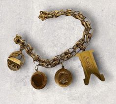 "GORGEOUS VINTAGE 14K YELLOW GOLD HEAVY CHARM BRACELET WITH VINTAGE CHARMS! 7 1/2\" 14K GOLD 11mm Width Bracelet! 4 CHARMS INCLUDING: Round Merry Xmas (Engraved on back: Love Lee 1962) measures 1\" round. Boy Face Silouette (Engraved on back: Wayne Lee 12-31-62) measures 3/4\" round. Horseshoe w/diamond Carry me for Goodluck (Engraved on back: 12/25/63) measures 3/4\" round. KEY LIKE ? CHARM (Engraved M.S.F. BERLIN and LR) measures 1 1/2\" x 3/4\" Fully hallmarked/tested acid/spectrometer SOLID Black Opal Pendant, Boy Face, Holiday Gift Wrap, Black Gift Boxes, Opal Pendants, Merry Xmas, Star Pendant, Black Opal, Vintage Charms