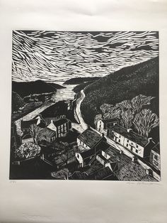 a black and white drawing of a town