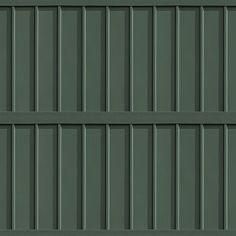 the side of a building with green siding