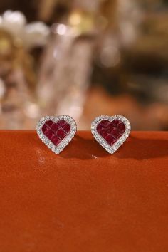 *Material: 18K Solid Gold (Yellow Gold, White Gold) *Diamond: Genuine Diamond, 0.06ct *Ruby: Genuine Ruby, 0.28ct *Earrings Weight: 1.35g *Push Backs: 18K Solid Gold *Price: CAD 705 (Per Pair) *Certification: Available for an additional CAD 44 *Handcrafting Time: 5-7 days *Shipping: Complimentary standard shipping with all import taxes covered; delivery in 10-20 days *Return Policy: 30-day return policy. We cover shipping costs for quality issues; customer covers return shipping for personal pre Luxury Heart-shaped Cubic Zirconia Earrings, Heart-shaped Wedding Earrings For Valentine's Day, Luxury Heart-shaped Brilliant Cut Earrings, Luxury Diamond Heart Earrings For Gift, Formal Heart-shaped Sterling Silver Earrings, Yellow Gold Heart Earrings For Valentine's Day Wedding, Diamond Heart Cut Earrings For Wedding, Yellow Gold Heart Earrings For Wedding And Valentine's Day, Double Heart Earrings For Valentine's Day Anniversary