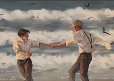 two people holding hands on the beach with seagulls flying in the sky behind them