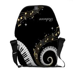 a black and white piano with musical notes on it messenger bag for women or girls