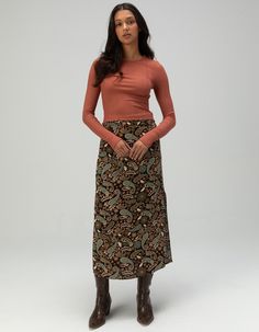 O'neill Sunni Rosa Midi Skirt. Allover Print. Leg Slits At Each Side. Discrete Side Zipper Closure. Approx. Length: 35.5''. 100% Viscose. Machine Wash. Imported. Model Is Wearing A Size Small. Model Measurements:height: 5'8" Bust: 32"waist: 24"hips: 35" Long Fall Skirt, Fall Ribbed Midi Length Skirt, Fall Midi-length Lined Pencil Skirt, Flattering Fitted Midi-length Skirt, Non-stretch Floral Print Midi Skirt, Beach-ready Floral Print Midi Skirt, Skirt Casual, Pencil Skirts, Black Midi Skirt