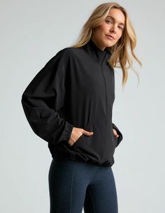 Stretch Woven In Stride Half Zip Pullover | Beyond Yoga Athleisure Half-zip Tops With Pockets, Sports Half-zip Top With Relaxed Fit, Relaxed Fit Half-zip Top For Sports, Relaxed Fit Half-zip Sports Top, Versatile Moisture-wicking Half-zip Activewear, Athleisure Sports Tops With Pockets, Sportswear Tops With Pockets For Workout, Functional Go-dry Half-zip Activewear, Functional Half-zip Go-dry Activewear