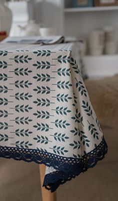 a table with a blue and white cloth on it