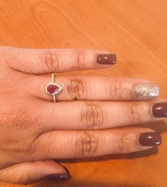 For Sale on 1stDibs - A simple yet beautiful ring with a 0.88 Carat Pear Cut Ruby as its center and 32 Round Cut Diamonds that weigh 0.20 carats. The total carat weight of the Ruby Diamond, Bridal Ring, Beautiful Ring, Pear Cut, Round Cut Diamond, Bridal Rings, Beautiful Rings, Round Cut, Heart Ring