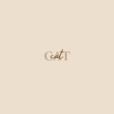 the word cat is written in gold on a beige background