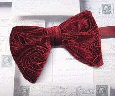 "Beautiful pre-tied, adjustable double tiered banded bow tie.  It will adjust from 13\" through 20\" neck. Bow dimensions 3.25\" x 4.5\"." Elegant Red Adjustable Bow, Red Adjustable Bow Tie With Bow Tie Back, Adjustable Red Bow Tie With Bow Tie Back, Adjustable Red Bow With Ties, Classic Adjustable Red Bow, Red Adjustable Tie For Wedding, Adjustable Red Ties For Wedding, Red Adjustable Ties For Weddings, Red Adjustable Wedding Ties