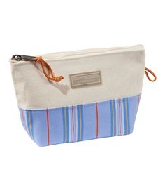 We make this classic canvas pouch right here in Maine - carry it on its own or inside one of our Boat and Totes. 100% cotton canvas. Spot clean. Same durable cotton canvas fabric as our iconic Boat and Tote. Overlapped seams are double-stitched with nylon so they won't rot or break. Zipper pull is made with our Bean Boot laces. Pouch keeps smaller items organized inside your backpack or tote. Stands upright on its own. Made in Maine. | Boat and Tote Zip Pouch, Canvas/Nylon Cotton Pouch With Zipper For Everyday Use, Cotton Pouch With Zipper Closure For Everyday Use, White Cotton Pouch For Everyday Use, Travel Cotton Zipper Pouch, Cotton Travel Pouch, Boat And Tote, Boot Laces, Boat Tote, Bag Business