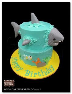 a birthday cake with a shark on top