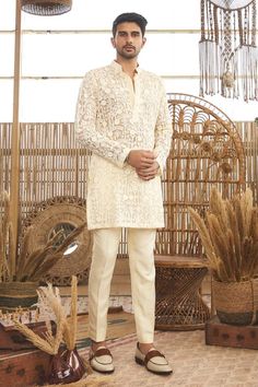 Beige full sleeves kurta with all over bloom thread work embroidery. Paired with solid pant.
Components: 2
Pattern: Embroidery
Type Of Work: Bloom
Neckline: Mandarin Collar
Sleeve Type: Full
Color: Beige
Occasion: Mehendi and Puja - Aza Fashions Cream Bollywood Bandhgala With Intricate Embroidery, Semi-stitched Cream Bandhgala With Resham Embroidery, Beige Embroidered Long Sleeve Kurta, White Semi-stitched Embroidered Bandhgala, Organza Kurta Set, Beige Embroidered Long Sleeve Sherwani, Organza Kurta, Red Kurta, Gents Kurta Design