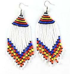 These African bead earrings are handmade by our Massai artisans in Kenya, East Africa. The beads are put on a string one by one and rolled around a wire. The entire process is done by hand. Authentic and Unique. Fair Trade Product. 100% handmade with love. Handmade in Kenya, East Africa Ethically & sustainably handcrafted Measures Approximately 2" in diameter Artisans make 2-3 times what they would earn in their local market. Each pair of earrings is made by hand so there may be slight and s Multicolor Hand-strung Dangle Beaded Necklaces, Artisan Beaded Earrings For Festivals, Artisan Adjustable Beaded Earrings With Tiny Beads, Artisan Adjustable Hand-strung Earrings, Unique Adjustable Beaded Earrings With Large Beads, Beach Jewelry With Dangling Round Beads, Beach Jewelry With Dangling Beads, Luxury Dangling Round Beads Jewelry For Beach, Artisan Handmade Adjustable Beaded Earrings