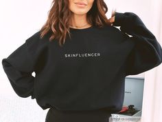 Get ready to elevate your style with our Embroidered Esthetician Sweatshirt! This beauty is not just any ordinary shirt - it's a statement piece that showcases your passion and profession. Made with love and attention to detail, this soft and cozy sweatshirt is perfect for those chilly days at the spa or simply lounging in style. Treat yourself or surprise your favorite esthetician with a unique gift that celebrates their hard work and dedication. It's time to wear your esthetics pride! This uni Esthetician Hoodie, Esthetician Sweatshirt, Esthetician Room Decor, Esthetician Room, Merch Ideas, Embroidered Crewneck, The Spa, Hard Work And Dedication, Cozy Sweatshirts