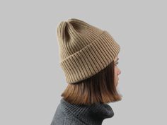 Sloushy beanie, Winter hat. This slouchy beanie from natural undyed Mongolian camel wool will keep you warm during colder seasons. There are multiple ways of how you could wear the hat, which means by purchasing one product you get a variety of stylish looks. WHY CAMEL? - Undyed camel wool is eco-friendly and animal cruelty free material.  - Because of its natural temperature regulating properties, camel wool is the ideal material for any type of clothes. - Camel wool is more durable than sheep Cozy Beige Beanie Cap, Beige Soft Knit Cap, Warm Beige Hat One Size, Beige Soft Knit Beanie, Beige Soft Knit Beanie Hat, Beige Beanie Bonnet For Fall, Soft Knit Beanie Hat In Beige, Beige Winter Hat One Size, One Size Beige Hat For Winter