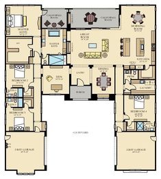 the floor plan for a two story home with multiple living areas and an attached kitchen