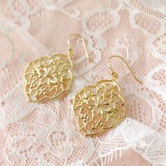 "Beautiful and lovely gold filigree charm earring . Made of gold filigree charm with gold plated ear wire. Soft and warm looking. Also simple and light weight earrings are good for everyday or special occasion. Your gold earrings will ship on lovelike gift box. If you have any question, please feel free to contact me. Thanks :) ♥Earrings measured 1.5\" drop. ♥ Gold plated over brass ♥ ♥ ♥ ♥ ♥ ♥ ♥ ♥ ♥ ♥ ♥ ♥ ♥ ♥ See more by lovelikestyle lovelikestyle.etsy.com ♥ ♥ ♥ ♥ ♥ ♥ ♥ ♥ ♥ ♥ ♥ ♥ ♥ ♥" Gold Filigree Dangle Earrings, Elegant Gold Plated Filigree Chandelier Earrings, Gold Plated Filigree Dangle Earrings, Bohemian Filigree Earrings Gift, Bohemian Gold Plated Filigree Earrings, Gold Filigree Earrings, Earrings Boho Chic, Chic Bohemian, Earrings Bridesmaid