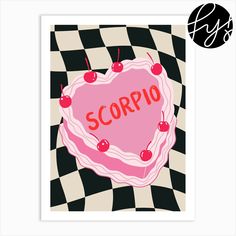 a pink heart shaped cake with the word scorpio on it's side