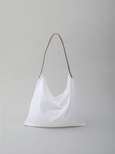 Composition : Bag Shell: Nylon Water-repellent Coating, Strap: Outer Fabric Cow leather 100% Inner Cotton PolyColor : Snow whiteCountry of Origin : Republic of Korea Nylon Hobo Tote Bag For Everyday, Everyday Nylon Hobo Tote Bag, Nylon Bags With Leather Handles For Daily Use, Daily Nylon Bags With Leather Handles, Modern Packable Shoulder Bag For Daily Use, Daily Use Nylon Bags With Leather Handles, Rectangular Nylon Hobo Bag, White Nylon Bag For Everyday Use, Rectangular Nylon Hobo Bag For Everyday Use