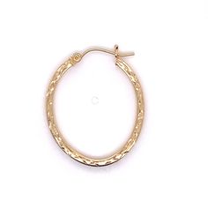 "Vintage 1980's 14k yellow gold half pair diamond cut oval hoop earring. The earring weighs .76 grams of gold. The height of the earring is 1.25\" and the width is 1\". Note - this is a half pair of earrings. There is no matching earring available." Hallmarked Oval 14k Gold Huggie Earrings, 14k Gold Oval Huggie Earrings Hallmarked, Engraved Oval Earrings For Anniversary, Oval 14k Gold Hoop Earrings For Anniversary, Gift 14k Stamped Oval Hoop Earrings, Oval Gold Jewelry With Diamond Cut, Oval Diamond Cut Hoop Earrings For Formal Occasions, 14k Gold Oval Diamond Cut Jewelry, Oval Diamond Cut Gold Jewelry