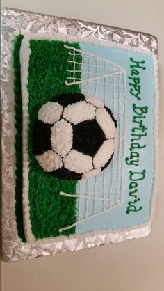 a birthday cake with a soccer ball on it