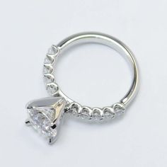 a diamond ring on a white background