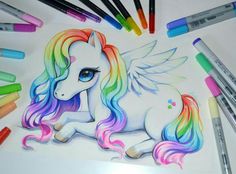 a drawing of a unicorn with pastel crayons around it