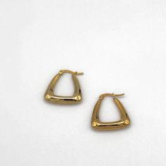 Elegant hallowed out gold triangle shaped hoop earrings Everyday Gold Triangle Earrings, Gold Triangle Minimalist Earrings, Modern Triangle Gold Hoop Earrings, Gold Triangle Metal Jewelry, Gold Triangle Metal Earrings, Shaped Hoop Earrings, Earrings Triangle, Gold Triangle, Triangle Shape