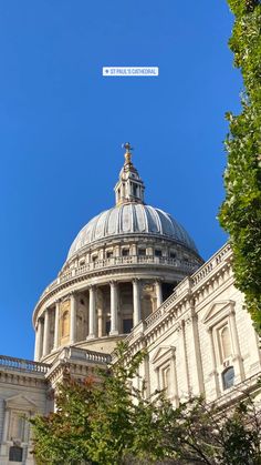 the dome of st paul's cathedral on a sunny day in london, england