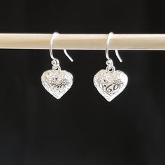 "- Gorgeous Filigree Connector Heart Pendant, or Necklace, in 925 Antique Sterling Silver Plated Pewter in Open-Cut design. See Photos #1-3. - Heart measures 5/8 x 3/4\". - Chain Length is 20\". - 925 Sterling Silver Filled Small Oval Rolo Chain. - Silver Plated EZ Toggle Clasp in Leaf motif for closure. See Photo #4. - We can customize the Clasp upon request at no cost. Choices include Lobster, Heart Toggle and Hook and Eye. Give us a Note on Etsy at Checkout with any change request. - Photos i Fish Hooks, Turquoise Heart, Gold Cross Pendant, Puffed Heart, Floral Heart, Heart Drop Earrings, Rainbow Earrings, Aqua Turquoise, Glass Heart