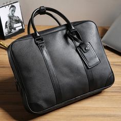 Usage: laptop document men bag Type: leather Briefcases Style: Business Size: 14 inches Pattern Type: Solid Number of Handles/Straps: Single Material Composition: polyester Main Material: PU Lining Material: Polyester Item Width: 7cm Item Weight: 1.1kg Item Type: Briefcases Item Length: 40cm Item Height: 30cm Handle/Strap Type: Soft Handle Gender: MEN Exterior: Silt Pocket Closure Type: zipper Tote Bag Business, Mens Tote Bag, Prom 2015, Business Briefcase, Black Leather Handbag, Men Bag, Bag Business, Men's Totes, Laptop Briefcase