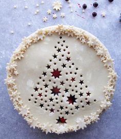 a pie with stars on it sitting on top of a table