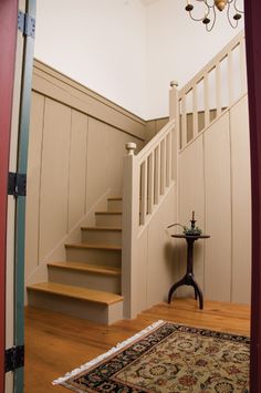 the stairs in this house are painted brown