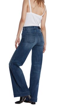 A mix of laid-back and dramatic, these full-length wide-leg jeans are cut from soft stretch denim partially made with sustainably sourced fibers. 32" inseam; 22" leg opening; 9 1/2" front rise Zip fly with button closure Five-pocket style 67% cotton, 27% REPREVE® recycled polyester, 5% rayon, 1% spandex REPREVE recycled polyester is made from 100% post-consumer recycled plastic bottles Machine wash, tumble dry Imported Denim Blue Mid-rise Relaxed Fit Flare Jeans, Dark Wash Full Length Flare Jeans In Recycled Denim, Wide Leg Recycled Denim Jeans, Relaxed Fit Wide Leg Flare Jeans In Recycled Denim, Modern Relaxed Fit Dark Wash Flare Jeans, Fall Wide Leg Flare Jeans In Recycled Denim, Modern Dark Wash Relaxed Fit Flare Jeans, Medium Wash Full-length Recycled Denim Flare Jeans, Denim Blue Flare Jeans In Recycled Denim