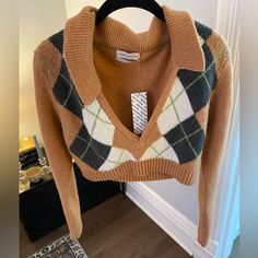 Never Worn In Great Condition. Super Cozy Too Urban Outfitters Orange Tops For Fall, Urban Outfitters V-neck Fall Sweater, Urban Outfitters V-neck Winter Sweater, Retro Urban Outfitters Tops For Fall, Fitted Urban Outfitters Sweater For Fall, Argile Sweater, Pastel Knits, Chunky Oversized Sweater, Oversized Striped Sweater