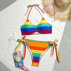 Rainbow Print Halter Swimsuit, rainbow Bikini, printed rainbow sexy bikini,two piece bikiniMaterial:blendedStyle:sexyFeatures:rainbowColor:as pictureSize(cm):S,M,L 1inch=2.54cmS:bust:71<p>M:bust:75</p><br/><p>L:bust:80</p><br/><p>Note:Due to different measurement methods,there will be 1-3 error(unite:cm), please understand.</p><br/><p>Please check the size carefully when you choose items,thank you.</p><br/> Multicolor Tie-side Swimwear For Beach Party, Multicolor Triangle Top Tankini For Beach Season, Multicolor Tie-side Bottom Swimwear For Summer, Multicolor Tie-side Bottom Tankini For Pool, Multicolor Tie-side Tankini For Pool, Summer Multicolor Tie-side Swimwear Bottom, Multicolor Tie-side Tankini For Beach, Rainbow Swimwear For Beach Season, Rainbow Summer Swimwear For Beach Season