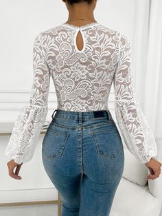 This Black Lace Ruffled Long Sleeve Bodysuit is the perfect mix of elegance and comfort. Crafted with fine lace and featuring a sleek and slim fit, this bodysuit is perfect for any special occasion. With its long sleeves and ruffled detail, you will be sure to stand out from the crowd! Cotton Imported Pull-On closure Hand Wash Only White Long Sleeve Lace Top For Formal Occasions, Elegant Party Bodysuit For Fall, Feminine Long Sleeve Lace Top For Party, White Long Sleeve Lace Top For Formal Events, Spring Bodysuit With Long Sheer Sleeves, White Long Sleeve Lace Top For Party, Long Sleeve Lace Top With Sheer Sleeves For Party, Party Lace Top With Sheer Long Sleeves, White Lace Top With Sheer Sleeves For Parties