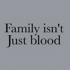 the words family isn't just blood against a gray background with black lettering on it