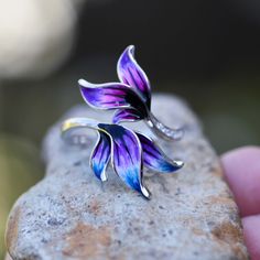 "I am no longer working with enamel so grab these while you can!! ( too many cheap copies of my work out there )- Hand Enameled - Colorful leaves, feather design  - 925 Sterling Silver - Cubic Zirconia This ring was made by first carving it in wax and then casting it. I usually make two at a time from one casting. This ring is really lovely, with a three dimensional leaf design that was enameled by hand. Since the enamel is done by hand each ring is a little bit different. If I don't have your size ready to go, get ahold of me. I don't always have the time but if I do, I will be happy to make it up for you in your size. This will come in a pretty gift box. Please note that I have only one of each size shown. Custom order sizes can be done as well. Please note custom sizes can take up to 8 Pink Feathers, Feather Design, Enamel Ring, Leaf Flowers, Delicate Jewelry, Colorful Leaves, Pretty Gift, Purple Fashion, Flower Ring