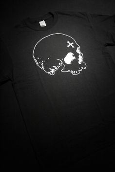 An old classic skull design from me now available as t-shirt. Screen-printed on Gildan Heavy Cotton t-shirt. Ships worldwide!Model is Oskar, also check out his killer band Wormwood! Alternative Skull Graphic Print T-shirt, Edgy Skull Graphic Print T-shirt, Cotton Grunge T-shirt With Skull Print, Unisex Cotton T-shirt With Skull Print, Skull Print Streetwear T-shirt, Alternative Short Sleeve T-shirt With Skull Print, Alternative Streetwear T-shirt With Skull Print, Alternative Style Skull Print Short Sleeve T-shirt, Skull Screen Print Graphic Tee