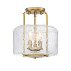 A perfect blend of traditional and contemporary creates the classic, timeless design of the Avalon. This ceiling fixture is an excellent fit for your transitional, traditional, or modern farmhouse decor style. The solid, circular ceiling plate holds a frame of three bold vertical bars, flat round finial, and inner, 3-light structure with metal candle covers —all with a rich, warm brass finish. One large drum-shaped shade is made of delightful, clear, crackled glass. Within the glass shade, three 60W, C-style bulbs provide plenty of illumination. The Avalon measures 11.5” wide and 12.25” high, with a semi-flush mounting: ideal for your living room, dining room, kitchen, family room, bedroom, foyer, great room, closet, office, or hallway. Transitional Traditional, Circular Ceiling, Savoy House Lighting, Farmhouse Inspiration, Candle Cover, Savoy House, Crackle Glass