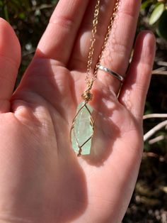 ☾ Raw Green Calcite Necklace ☾ High quality, rough green calcite in its raw form in a secure & subtle setting that highlights the stone These pendants come in pure copper, 14k gold, or sterling silver. Choose from an adjustable faux leather chord, a matching 18" copper chain, a matching 18" sterling silver chain, a matching 14k gold chain or get just the pendant. ⭐️Faux Leather Chord Options: Choose from black, dark brown or tan. These chords are also tied to be adjustable so you can wear it at Green Gemstone Pendant Crystal Necklace, Handmade Green Crystal Necklace Gift, Unique Green Crystal Necklaces With Gemstones, Green Aventurine Pendant Crystal Necklace, Unique Green Crystal Gemstone Necklace, Unique Green Crystal Necklace With Gemstone, Unique Green Crystal Pendant Necklace, Unique Green Pendant Crystal Necklace, Green Amazonite Jewelry As A Gift