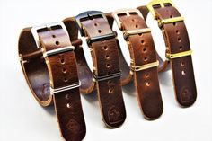 Width :18mm or 20mm or 22mm or 24 mm  Length : 28 cm  Strap Color: brown thickness leather 1,7-1,8mm  color of the rings in availableblack,silver,pink gold,yellow gold. Excellent quality genuine leather band . Hand Made, The wizard uses the highest grade leather made in Italy and Spain. Since the skin is natural. It is not repeated ever. All straps are different and have a unique beauty. A rugged, vintage military looking strap. Ideal for chunky analog watch or would look well on a modern IWatch. Personalised to your requirements. Also perfect for that one of a kind gift. Every strap I make is hand cut, hand stitched using a saddle stitch for maximum strength and durability. When you buy a watch strap made by me you will set yourself apart from the crowd. Truly unique and bespoke, artisan Army Style, Leather Factory, Army Fashion, Style Watch, Wrist Band, Military Army, Analog Watch, Vintage Military, Unique Beauty